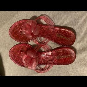 Slightly used Chanel jelly pink glitter flip flops